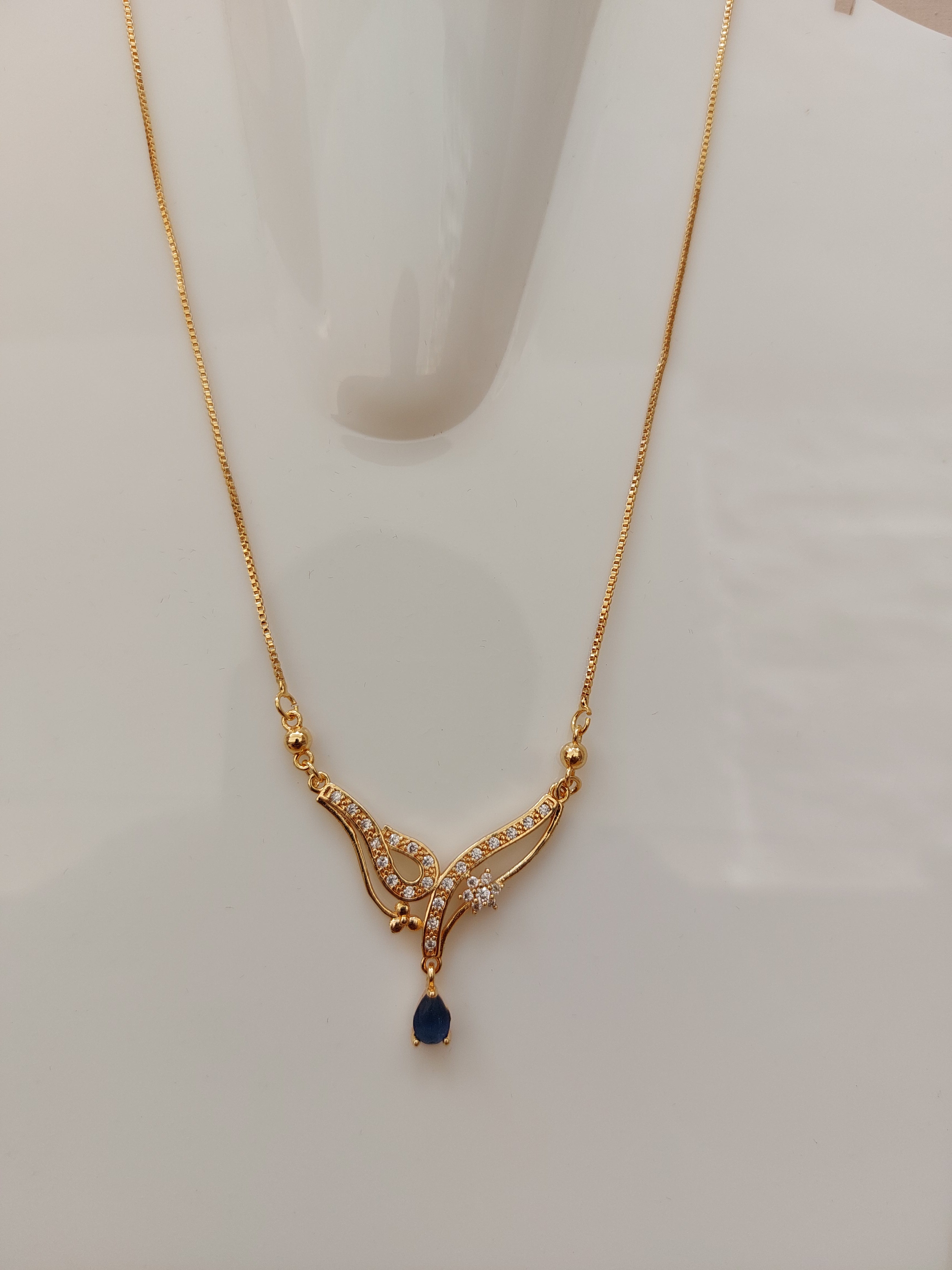 Designer_Rose_Gold_Pendant_with_Navy_blue_drop_AD_stone_A_2