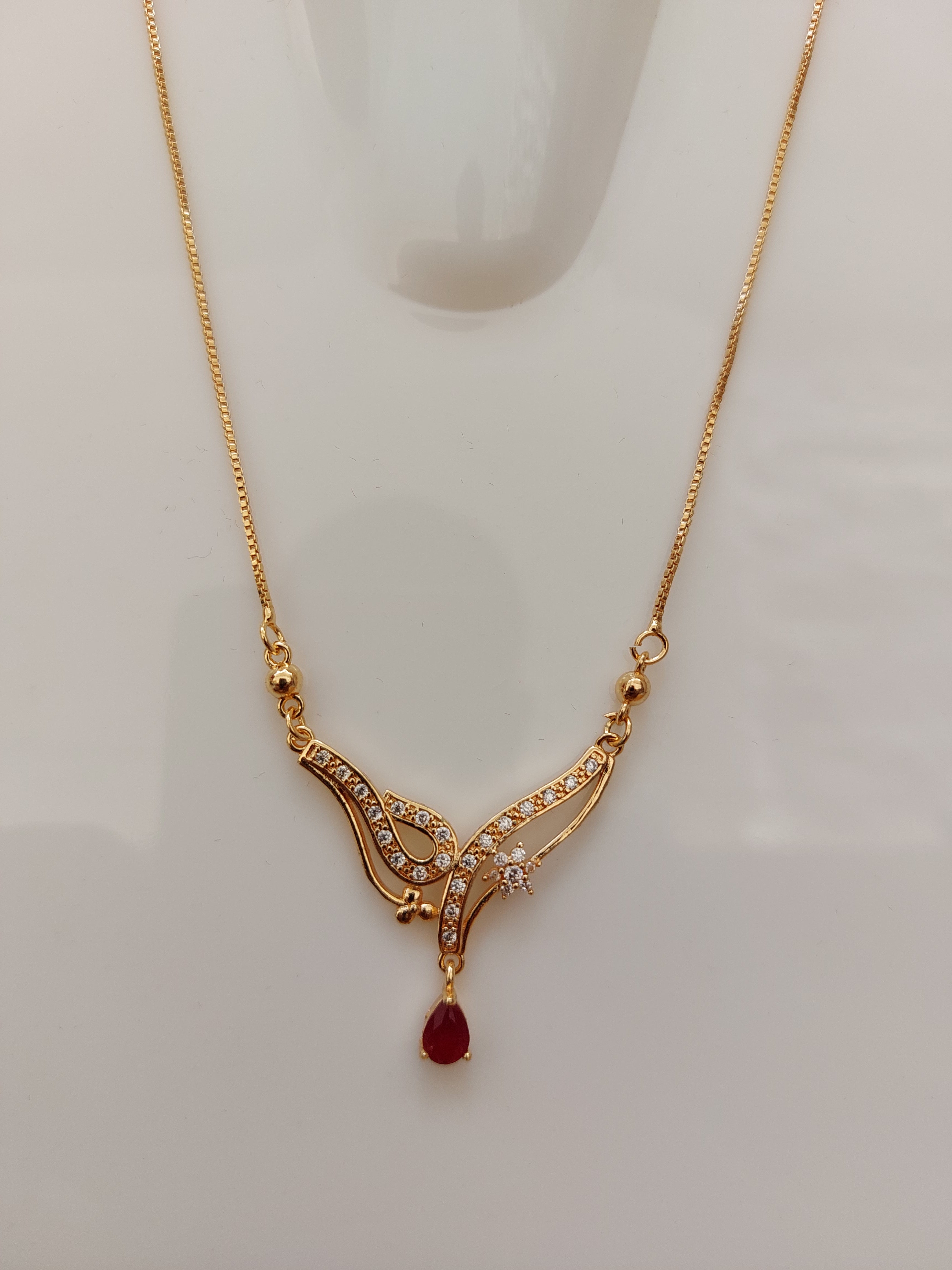 Designer_Rose_Gold_Pendant_with_Red_drop_AD_stone