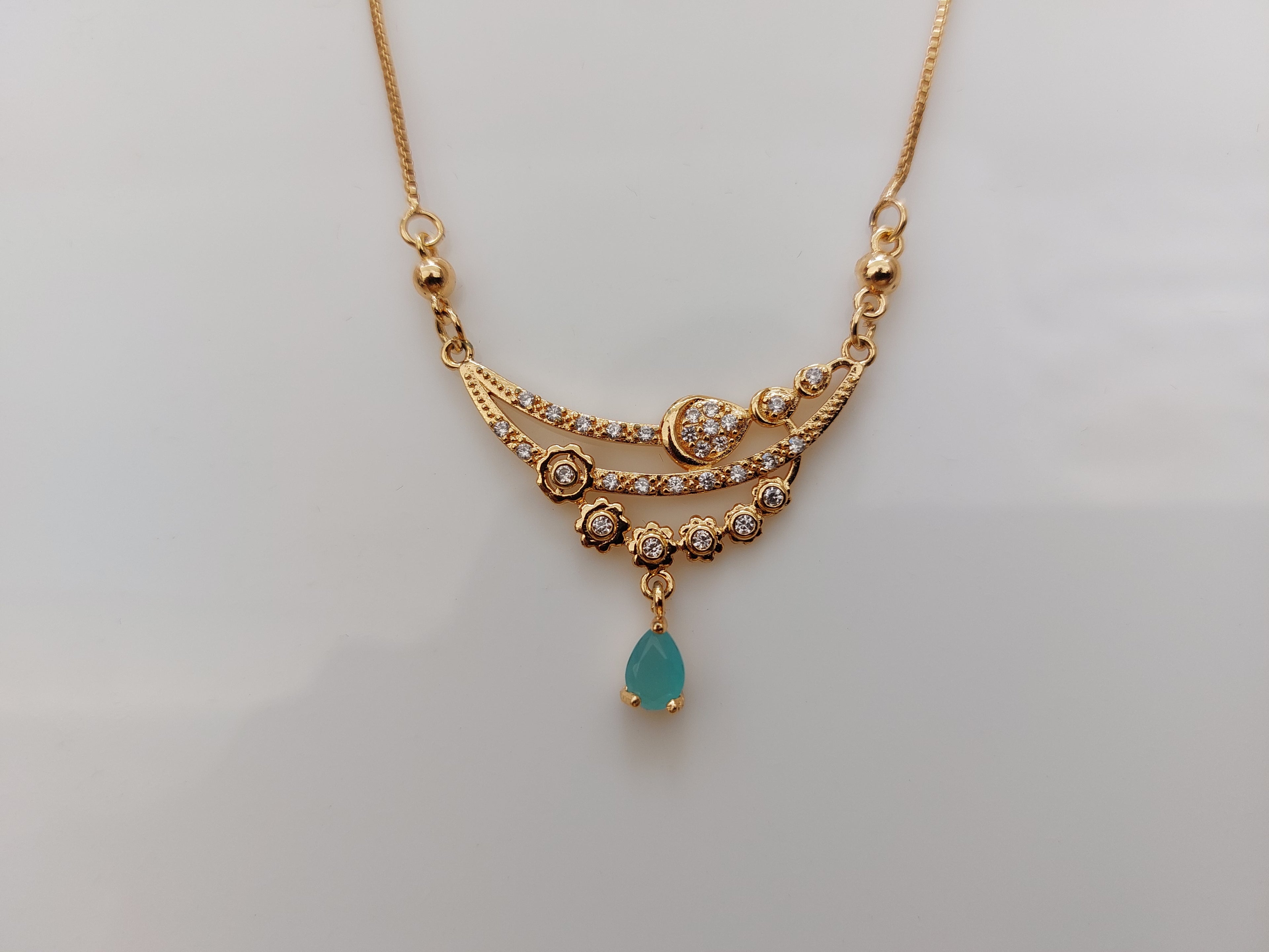Unique_Rose_Gold_Pendant_with_baby_Sea_Green_drop_AD_stone